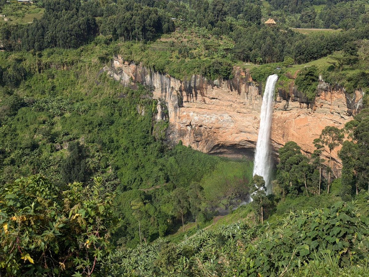 A waterfall falling through the green slopes of Mt. Elgon in eastern Uganda