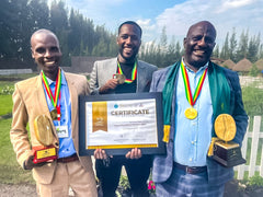 Mulugeta Muntasha with his Ethiopia Cup of Excellence certificate and medal